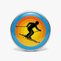 2.25-inch round skier skiing symbol pinback button with blue rim and colorful scene
