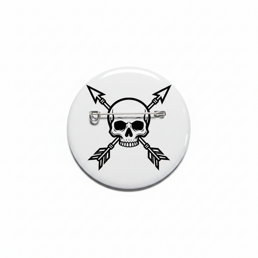 Round pinback button with black skull and crossed arrows, silver metal pin back