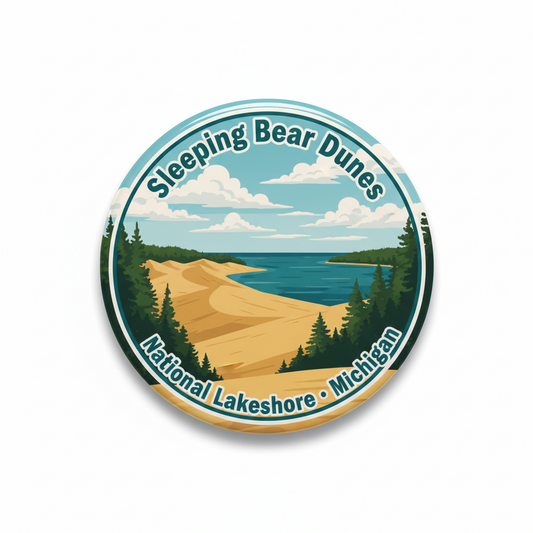 2.25-inch circular Sleeping Bear Dunes National Lakeshore pin with dunes, lake, trees and text
