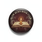 Round book club pinback button with candle and open book graphic, text 'Slow Burn Book Club'
