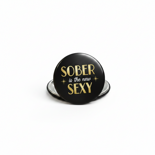 Black button with 'Sober is the new Sexy' text on a white background