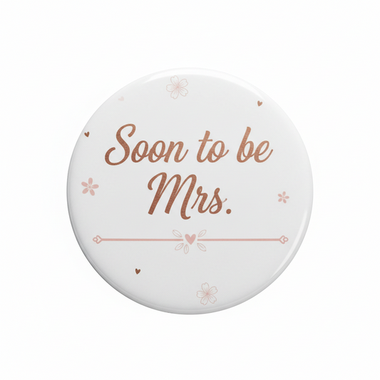 Soon to be Mrs pinback button, 2.25-inch, white with floral accents and “Soon to be Mrs.”