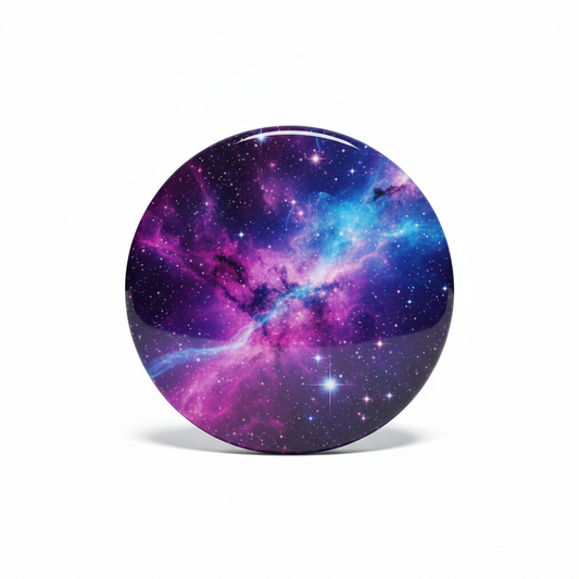 Round galaxy nebula pinback button, purple and blue with star speckles, 2.25-inch