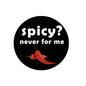 Round black pinback button with white "spicy? never for me" text and red chili peppers