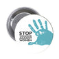 1.25-inch pinback button with white face, teal handprint, and black “STOP VIOLENCE AGAINST WOMEN”