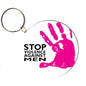 Pink round keychain with raised hand graphic and "STOP VIOLENCE AGAINST MEN" text