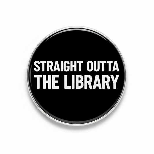2.25-inch black round pinback button with white 'STRAIGHT OUTTA THE LIBRARY' text