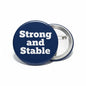 2.25-inch round pinback button, navy with white 'Strong and Stable' text, metal back