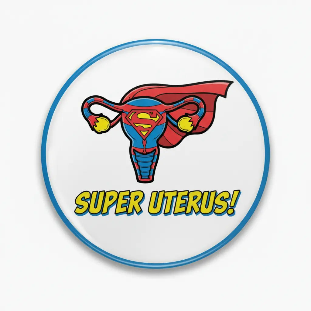 Circular uterus pinback button with blue rim, superhero graphic, and “SUPER UTERUS!” text