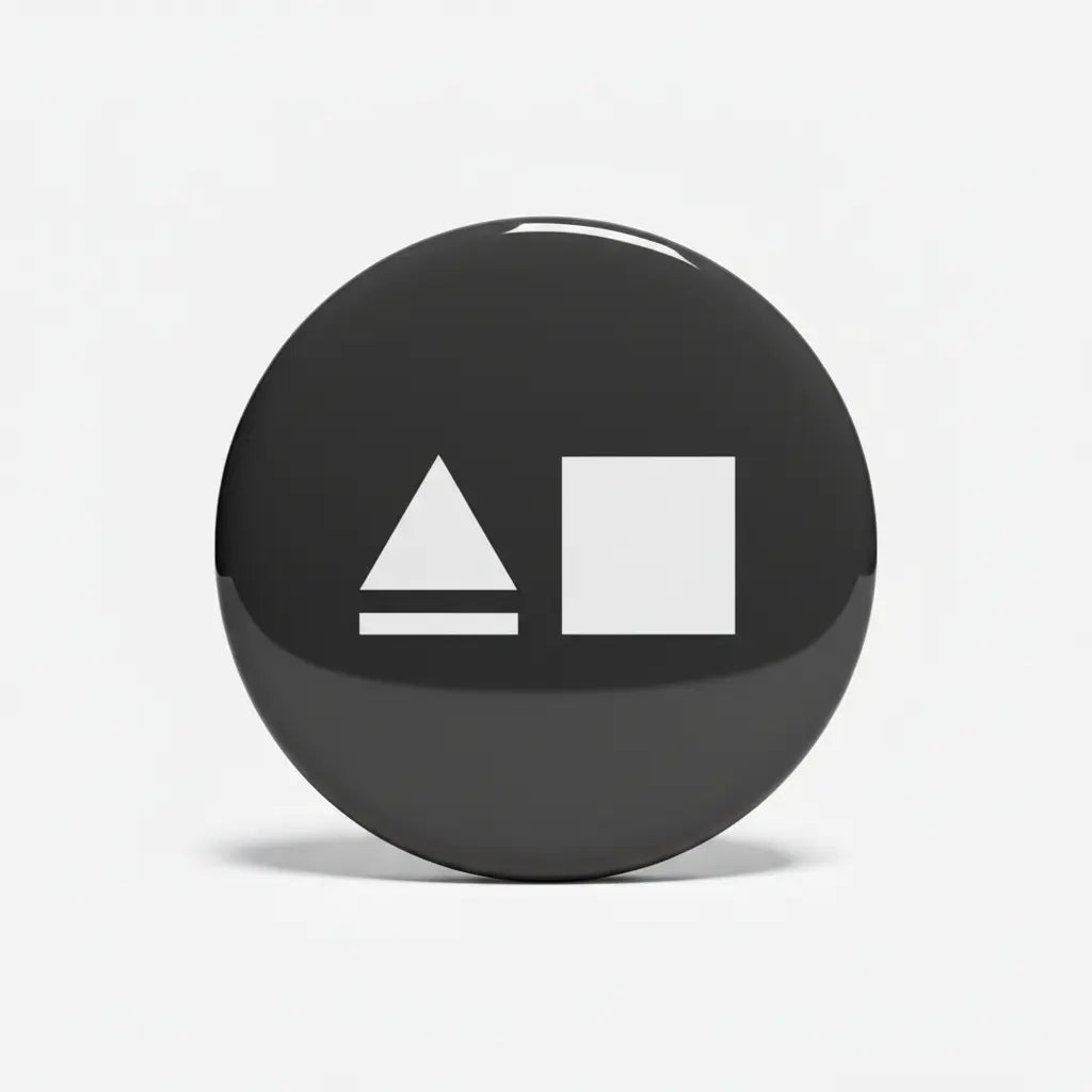 Black round pinback with white triangle and square symbol
