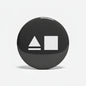 Black round pinback with white triangle and square symbol