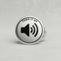 Round 2.25-inch volume pinback badge, 'TURN IT UP' speaker icon