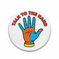 Round pinback button with colorful "Talk to the hand" text and cartoon hand icon