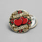 Round heart pinback with red hearts, roses, and text "TRUE LOVE FOREVER"