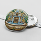 2.25-inch pinback button with colorful illustrated fountain in ornate border
