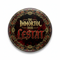 Round pinback button with gold 'The Immortal Tour' and 'Lestat' text on dark red