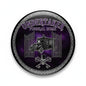 Round Undertaker Funeral Home pinback button with purple scene, gate and hearse graphic