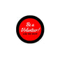 2.25-inch pinback button, red center with black rim; 'Be a Volunteer! Ask Me How'.