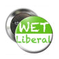 Round 1.25-inch metal pinback button with green-and-white text design