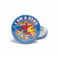2.25-inch wheelchair hero pinback button, blue round design with 'I AM A HERO' text