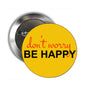 1.25-inch motivational pinback button with yellow face reading "don’t worry" and "BE HAPPY"