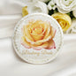 Round pinback with pastel rose and Blushing Bride script text