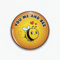 You Me and Bee pinback button, orange/yellow with cartoon bee and heart text