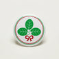 Festive holly leaves pinback button with bow, round white background, 2.25-inch size