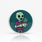 2.25-inch zombie coffee pinback button with mint head holding steaming cup