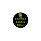 Halloween zombie killer pinback button, round black with green text and zombie graphic