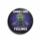 2.25-inch pinback button with green zombie cartoon and "Feelings" text