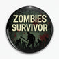 Round black Zombies Survivor pinback button with zombie silhouettes and red accents